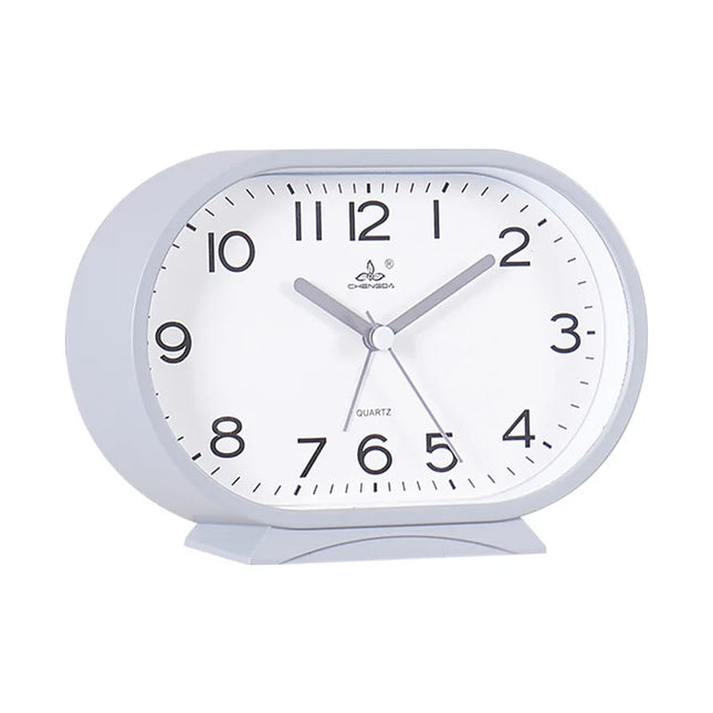 Reloj despertador analógico de forma ovalada