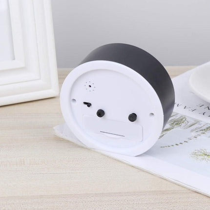 Despertador analógico a pilas sencillo