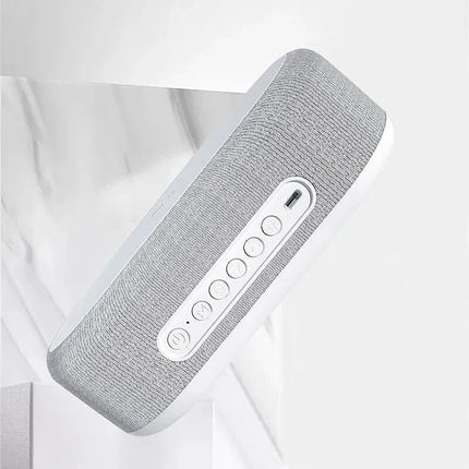 Altavoz despertador con carga inalámbrica