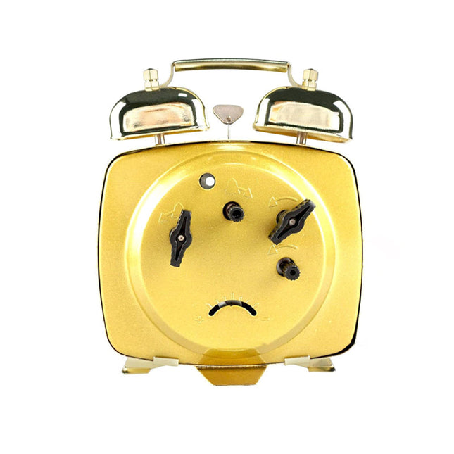 Pequeño despertador mecánico de viaje